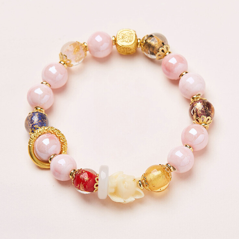 Yongxiang gleichen Stil Peking Asche glasiert Armband rosa Porzellan neunschwänzigen Fuchs Goldfolie Glück Armband beste Freundin Geschenk Großhandel