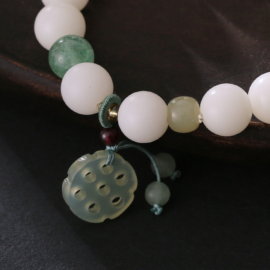 10 mm runde Perlen, Lotuswurzel, Tiancheng-Lotuswurzelscheiben-Stil Xiaohongshus beliebtes natürliches Bodhi-Armband aus weißer Hainan-Jade, Glücksbringer, Pfirsich-Sicherheitsschnalle, DIY-Design-Armband im Großhandel